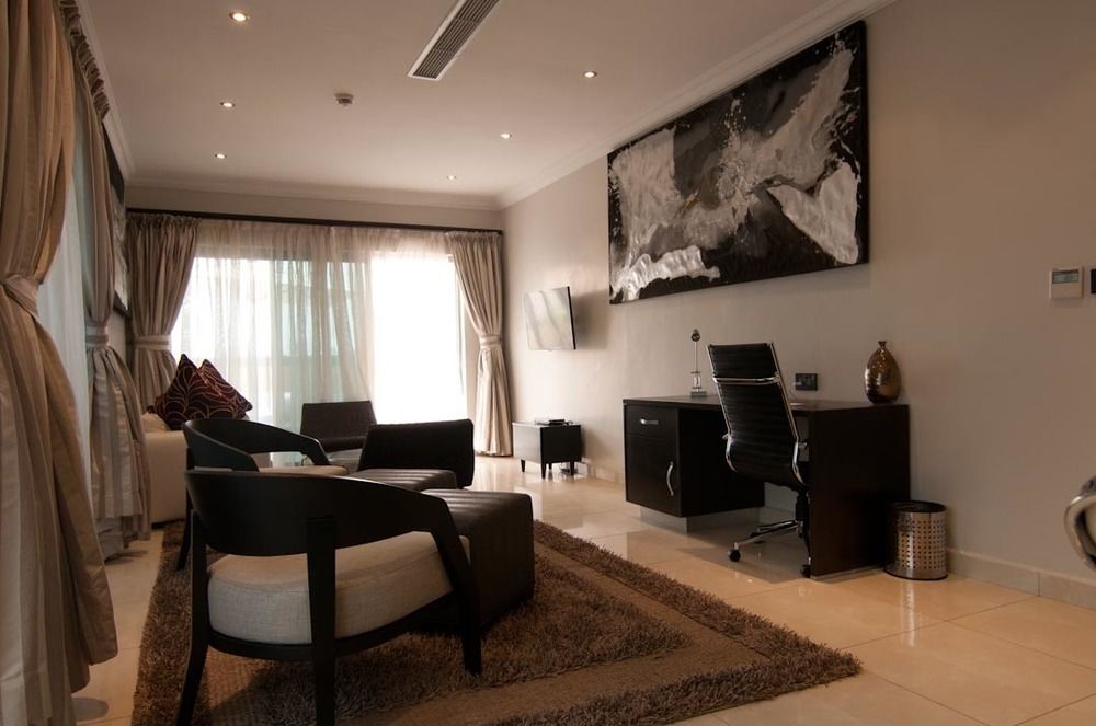 L'Eola Suites Абуджа Экстерьер фото