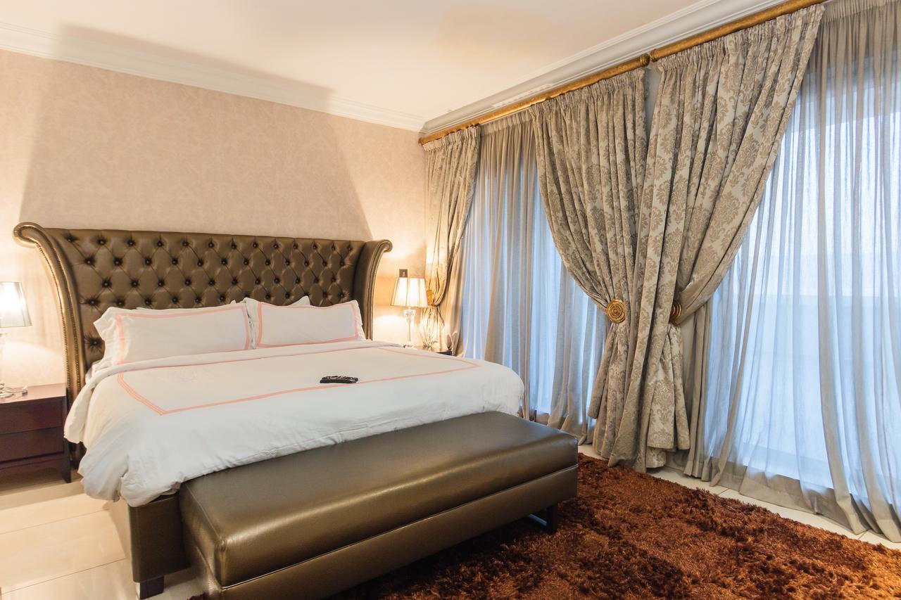 L'Eola Suites Абуджа Экстерьер фото